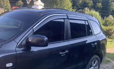 Hyundai Santa Fe 2 2006-2012 Deflettori finestrini con profilo cromato (4 pz, Niken) foto 1