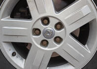 Renault Copri mozzo ruota grigi 81569 (57mm a 50mm, set 4 pezzi) foto 1