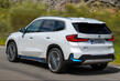 Panoramica del crossover elettrico compatto BMW iX1 foto 4