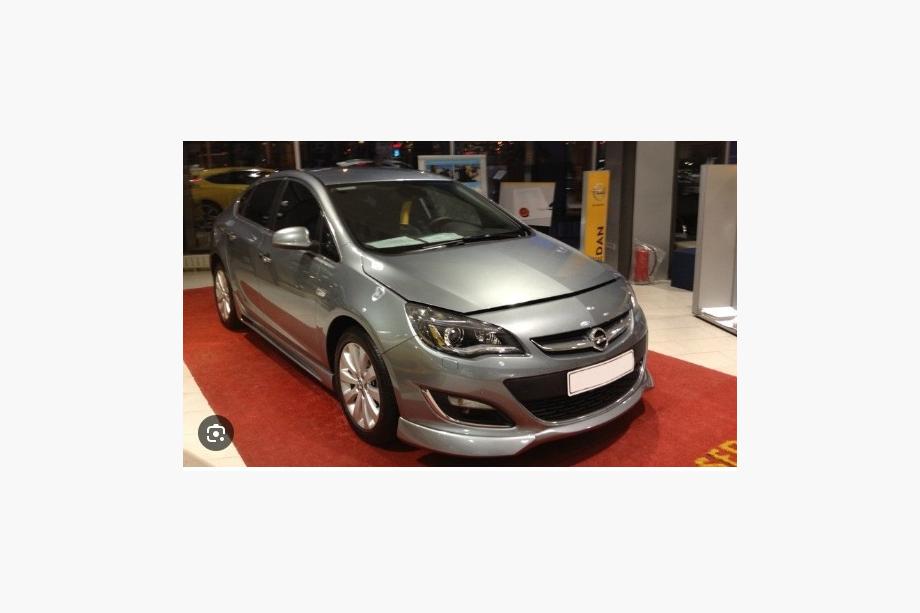 Opel Astra J 2009-2015 Labbro anteriore inferiore 2012-2015 (primer per verniciatura) Image