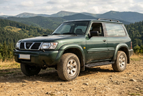 Nissan Patrol Y61 1997-2011 Pedane Laterali Allmond Black (2 pz, Alluminio) foto 1
