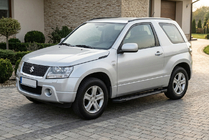 Suzuki Grand Vitara 2005-2017 Pedane Laterali RedLine Black (2 pz, Alluminio) foto 1