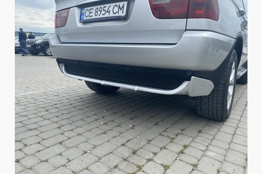 BMW X5 E53 1999–2006 Copertura paraurti posteriore (primer per verniciatura) Image
