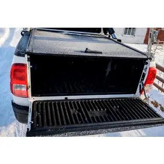 Copertura cassone a tapparella OEM (2020+, manuale con maniglia e serratura) Toyota Hilux 2015- foto 4