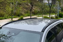 Toyota bZ3X 2025– Barre longitudinali al tetto integrate nere OEM (Alluminio) foto 1