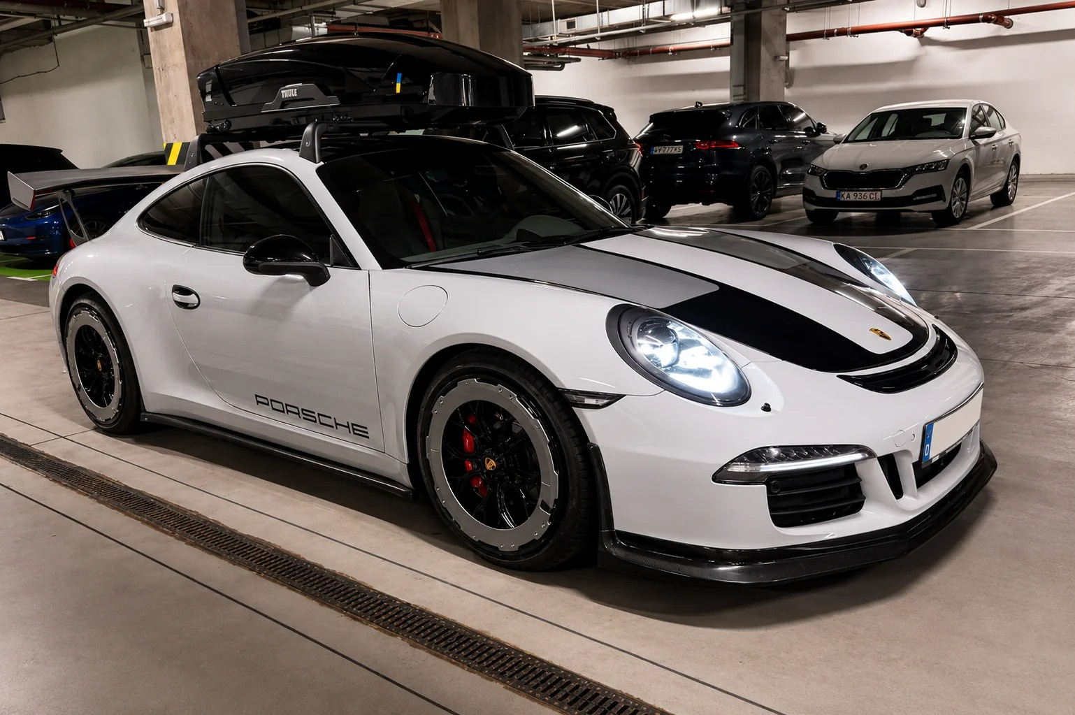 Aggiornamento Porsche 911 (991): spoiler in carbonio e cerchi