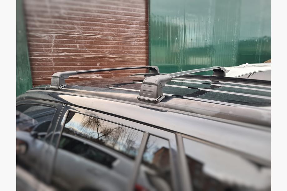 Suzuki Grand Vitara 2005-2017 Barre portatutto per punti di fissaggio originali (2 pz) Foto 2