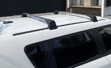 Renault Trafic 2001–2015 Barre portatutto per punti di fissaggio originali con chiave (2 pz) foto 1
