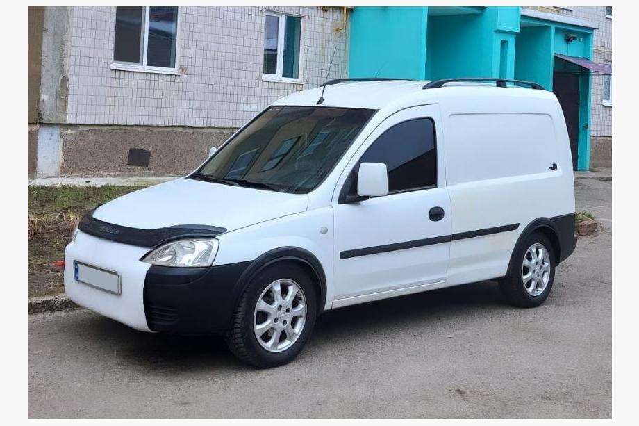 Opel Combo 2002–2012 Barre Tetto Nere Piedini in Ghisa Image
