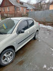 Peugeot 206 1998-2024 Coperture maniglie porta in acciaio inox foto 3