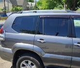 Toyota Land Cruiser Prado 120 2002-2009 Barre portatutto Cromate turche Piedini in plastica foto 1