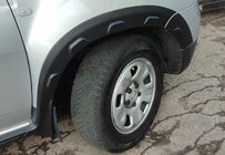 Dacia Duster 2008-2018 Allargamenti passaruota con bordini (8 pz, plastica) foto 11