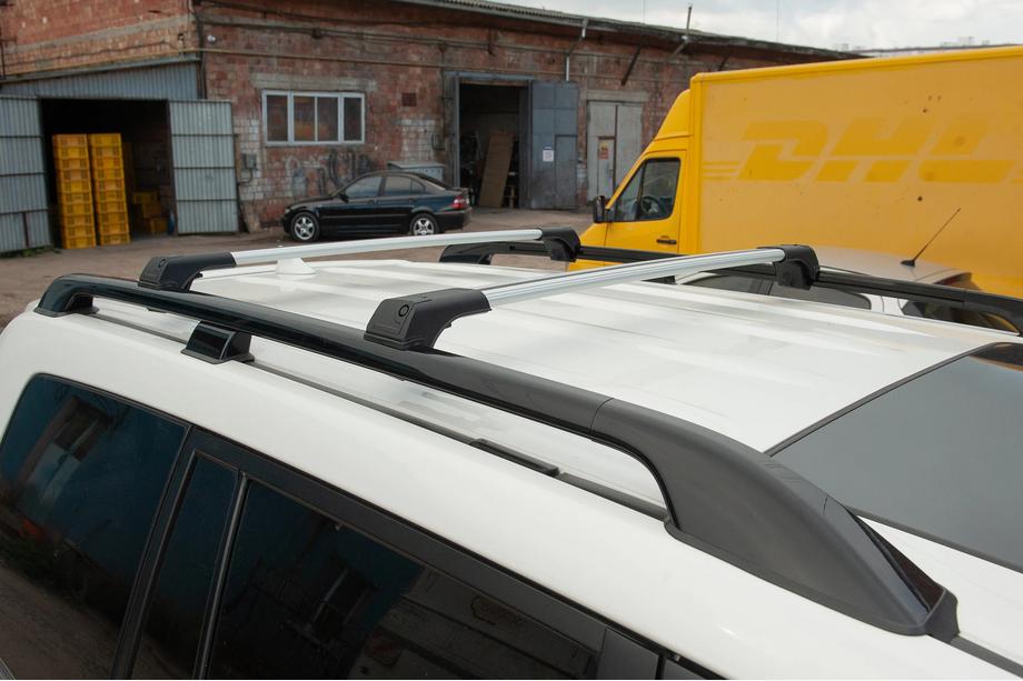 Nissan Qashqai 2007-2010 Barre portatutto per railings senza serratura Flybar V1 (2 pz) Image