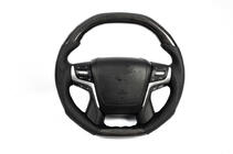 Toyota Land Cruiser 200 2007-2021 Volante completo (Carbonio) foto 1