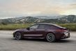 Panoramica della berlina sportiva BMW M8 Gran Coupé foto 7