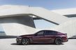 Panoramica della berlina sportiva BMW M8 Gran Coupé foto 9