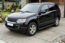 Suzuki Grand Vitara 2005-2017 Pedane Laterali Tayga Black (2 pz, Alluminio) foto 1