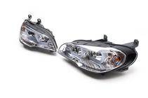 BMW X5 E70 2007-2013 Fari anteriori (2 pz, chiari) foto 4