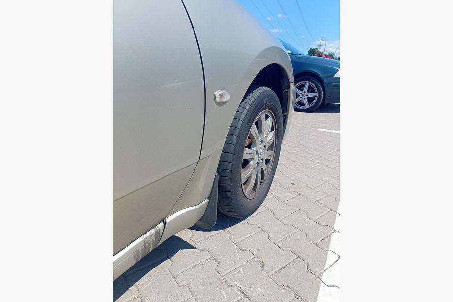 Mitsubishi Galant 2003-2012 Paraspruzzi originali Premium 2007-2012 (4 pz) Foto 10