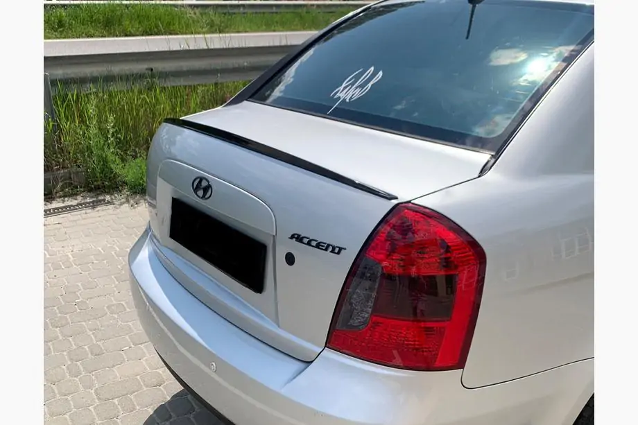 Hyundai Accent 2006-2010 Spoiler LIP (Sunplex, nero) (115,8cm x 6,3cm) Foto 1