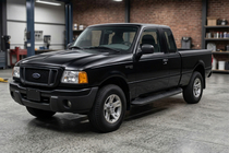 Ford Ranger 2002-2006 Pedane Laterali Tayga Black (2 pz, Alluminio) foto 1